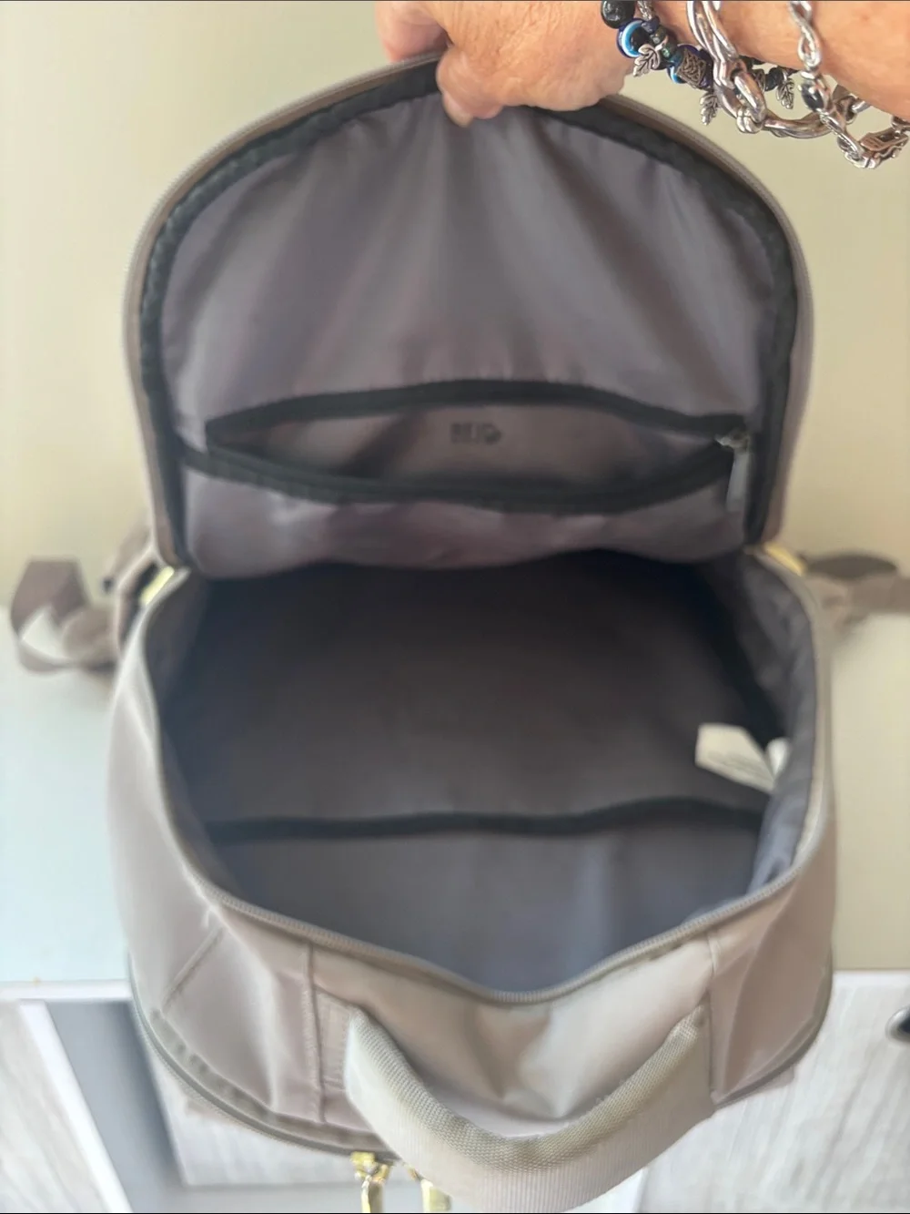 Neutral Gray Women's Backpack with Multiple Pockets